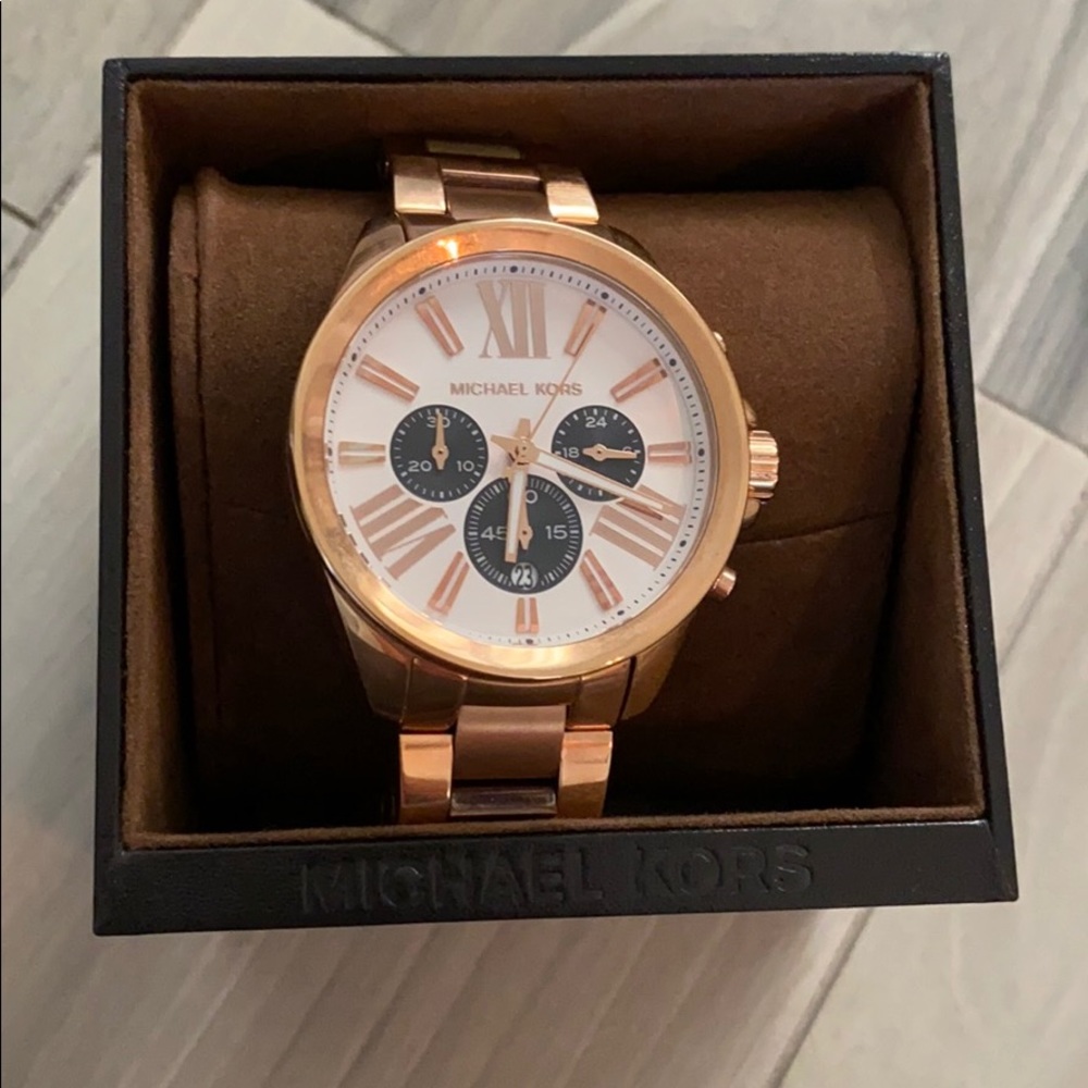 Michael Kors rose gold watch.